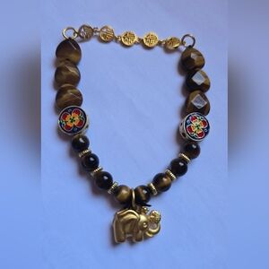 Tiger Eye Gold and Brown Bracelet With Elephant Dangle.